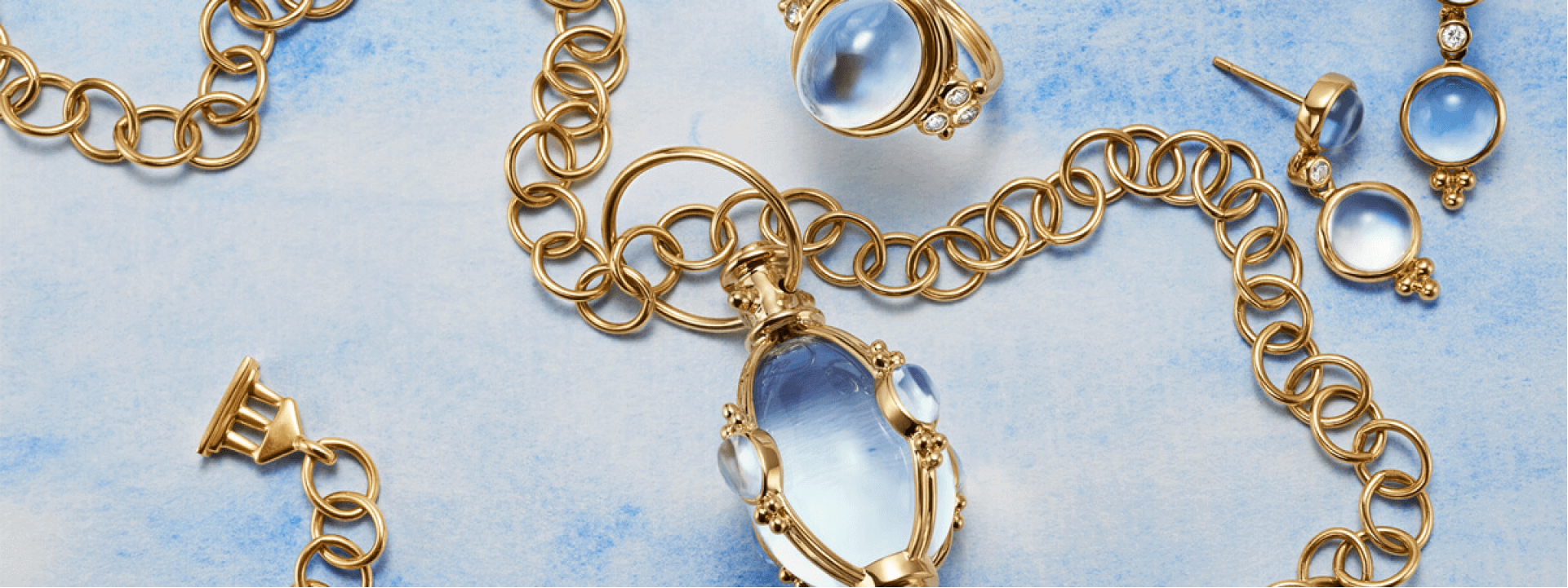 Luxury jewelry on blue textured background